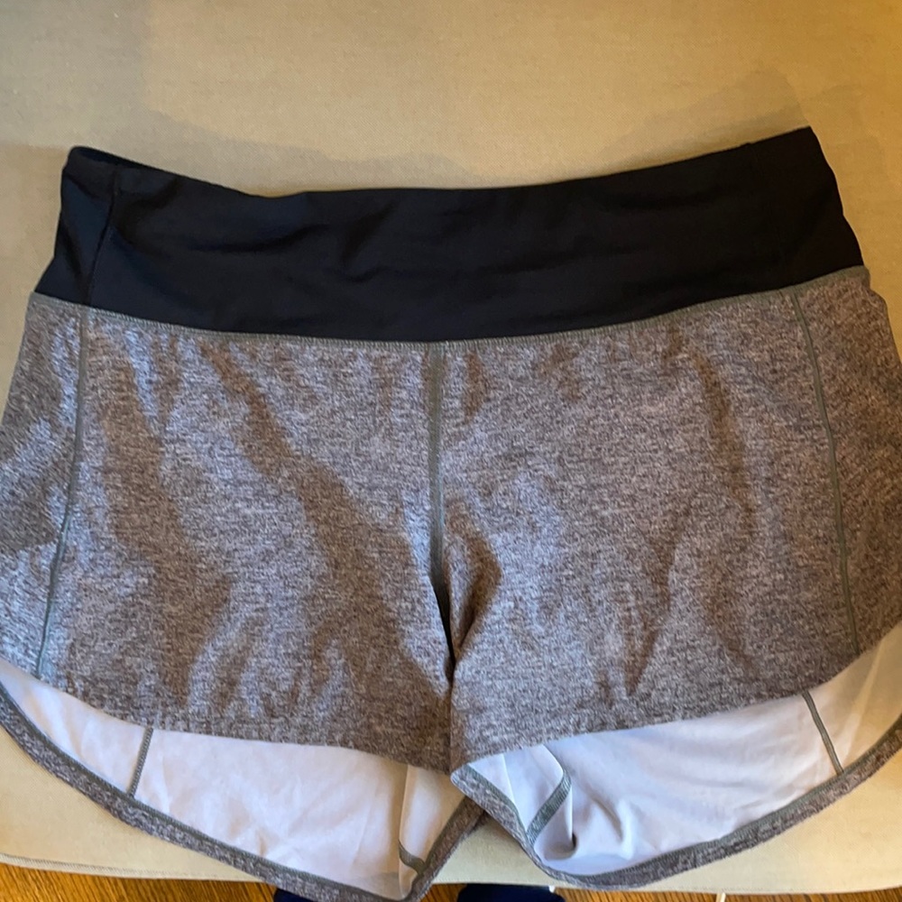 Size 8/ 5 in Lululemon lined athletic shorts